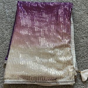 Brand new sequenced saree with semi stitched blouse! Two shade white and purple.